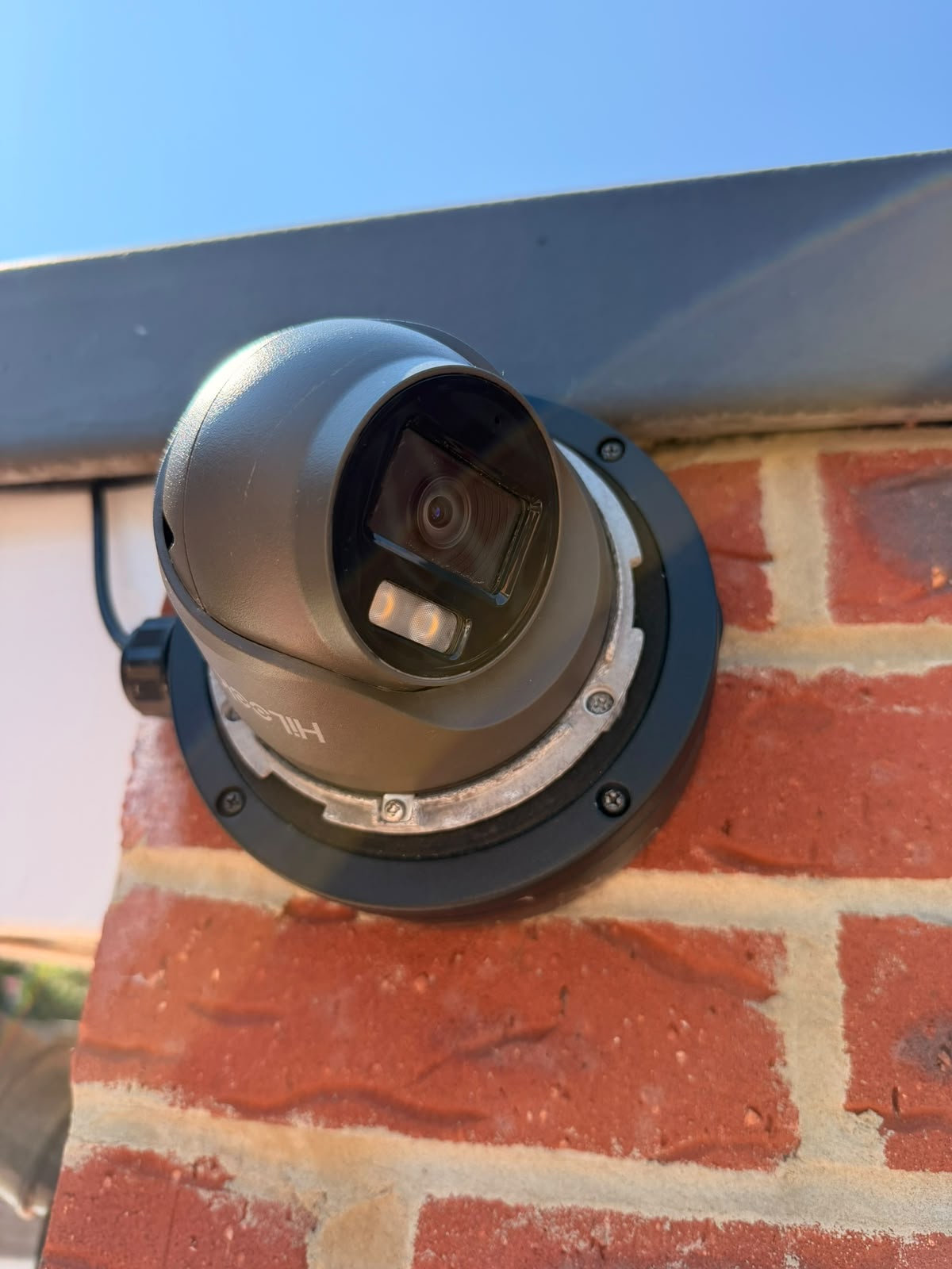Silver security camera installed by AG Surveillance